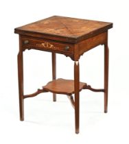 An early Edwardian inlaid envelope card table,