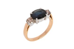 An 18 ct gold stamped 750 sapphire and coloured diamond ring. Size P 1/2, overall weight 4.