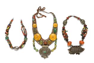 Three vintage Tibetan multi stone necklaces.