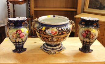 Victorian ceramic urn and pair of matching vases