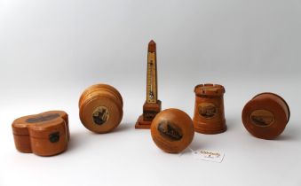 Six Mauchline wooden trinkets, darning mushroom, money box, thermometer,