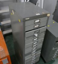 Tall metal filing cabinet