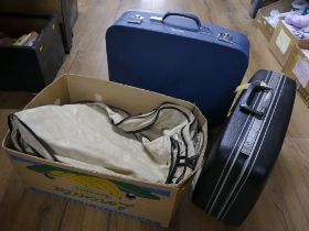 Suit or clothes covers and two suitcases