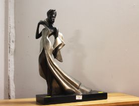 Stylised statue of a lady,