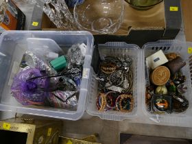 Three tubs of costume jewellery