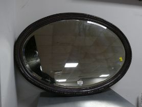 Oak bevelled edge oval shaped mirror