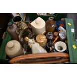 Stoneware hot water bottles and storage jars, wooden shuttle, ceramic jugs, brass picture frame,