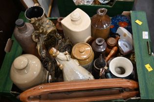 Stoneware hot water bottles and storage jars, wooden shuttle, ceramic jugs, brass picture frame,