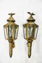 Pair of electric wall mounted brass carriage lamps,