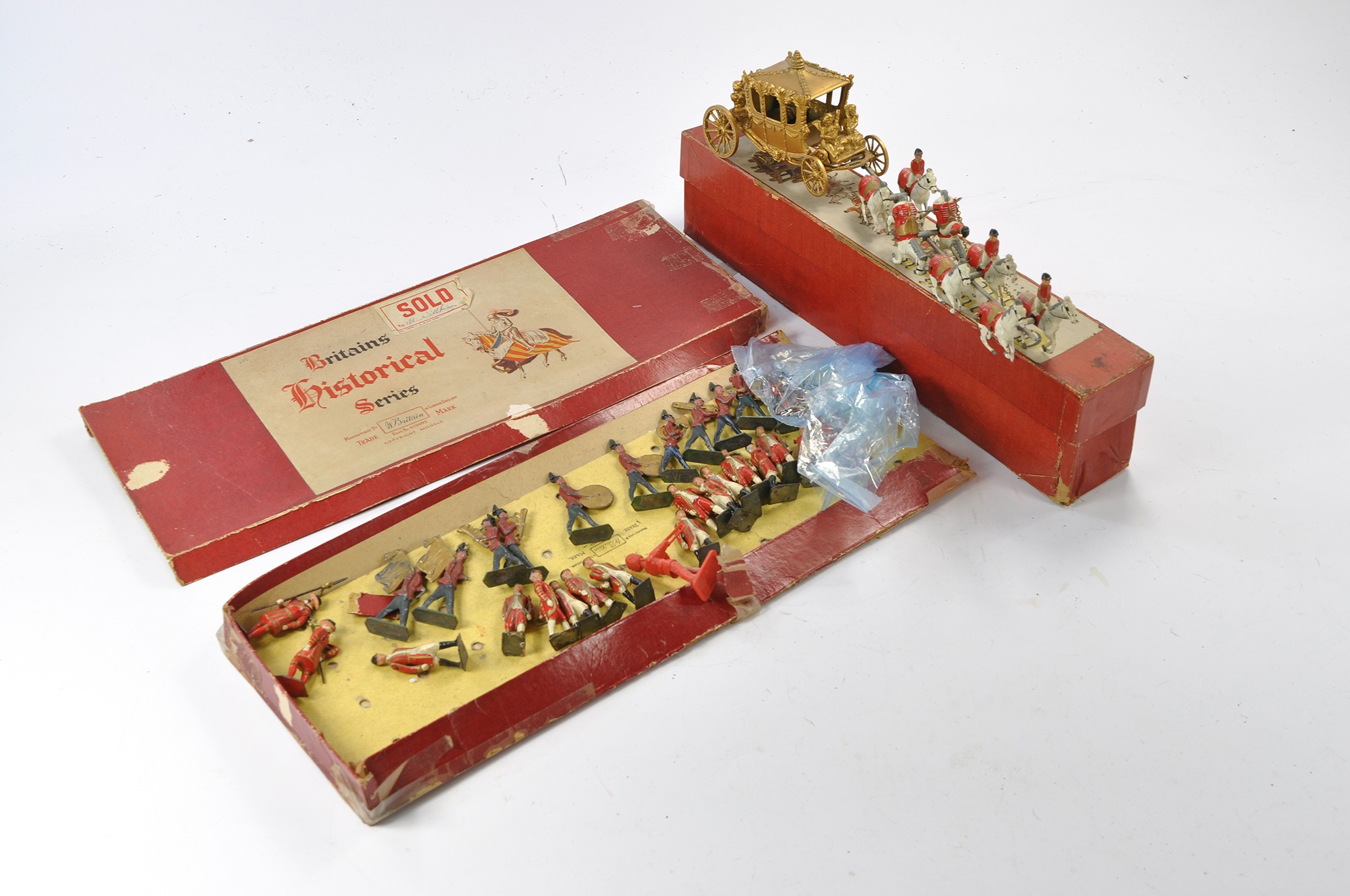 Mostly Britains lead metal soldier sets including State Coach. Fair only.