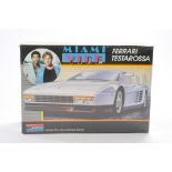 Monogram 1/24 plastic model kit comprising Miami Vice Ferrari Testarossa. Sealed.