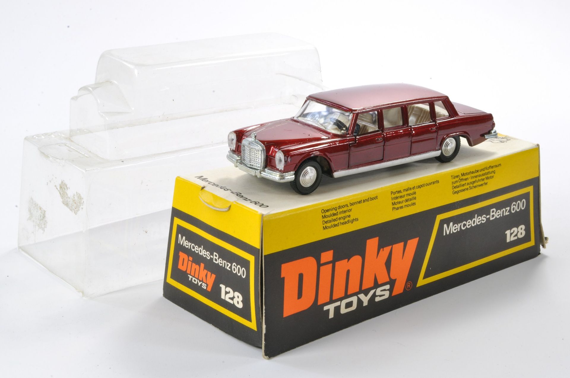 Dinky No. 128 Mercedes Benz 600. Maroon with white interior. Inc Figure. Generally excellent, only