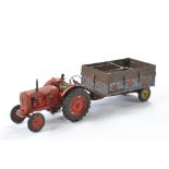 Farm Model Interest comprising a Scaledown Nuffield Tractor plus Trailer. Both are weathered.