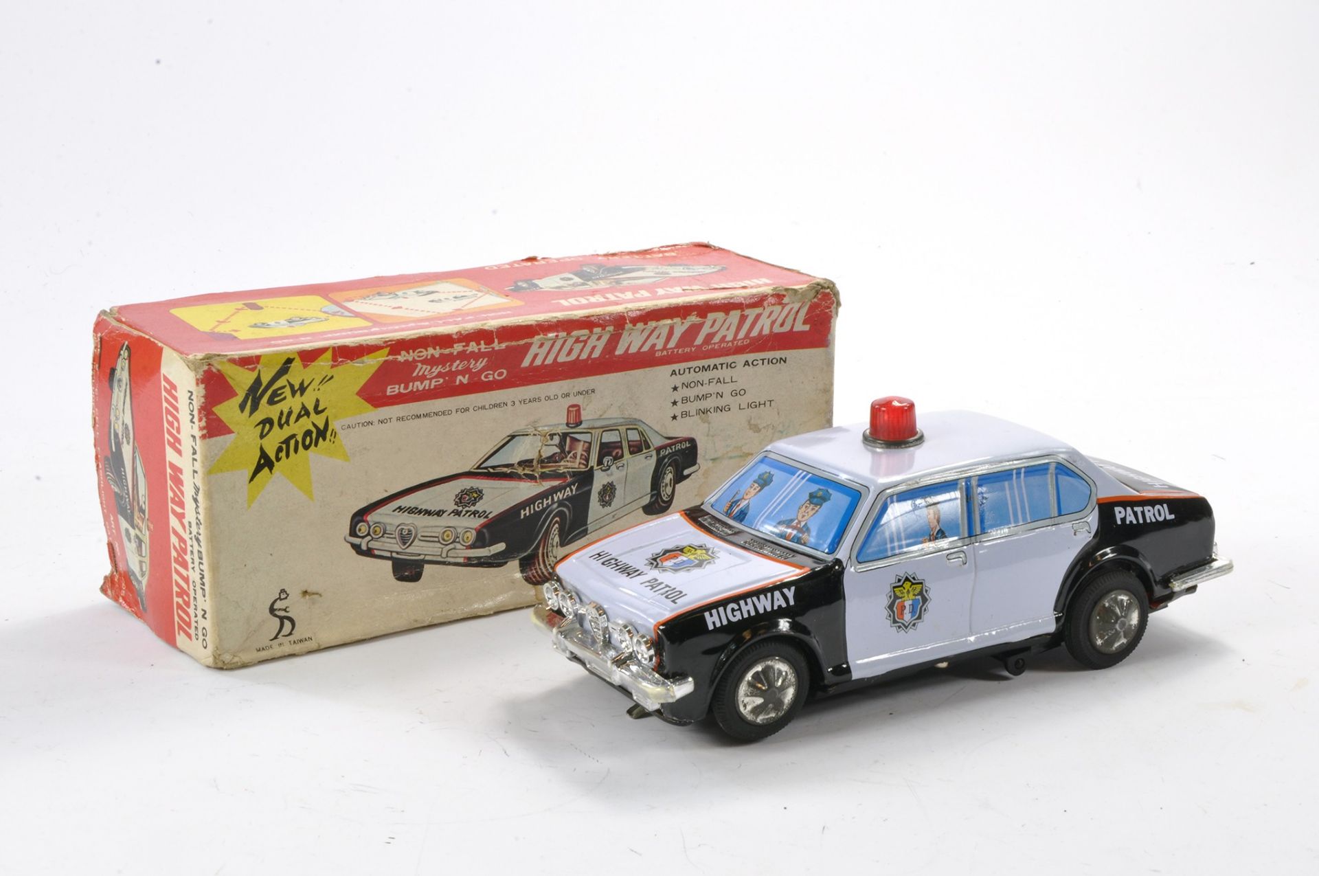 Taiyo Battery Operated Tinplate Mystery Bump n Go High Way Patrol Car. Very good to excellent in
