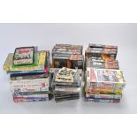 A collection of VHS Videos and Audio Books comprising the Beatles, James Bond, Star Wars etc.