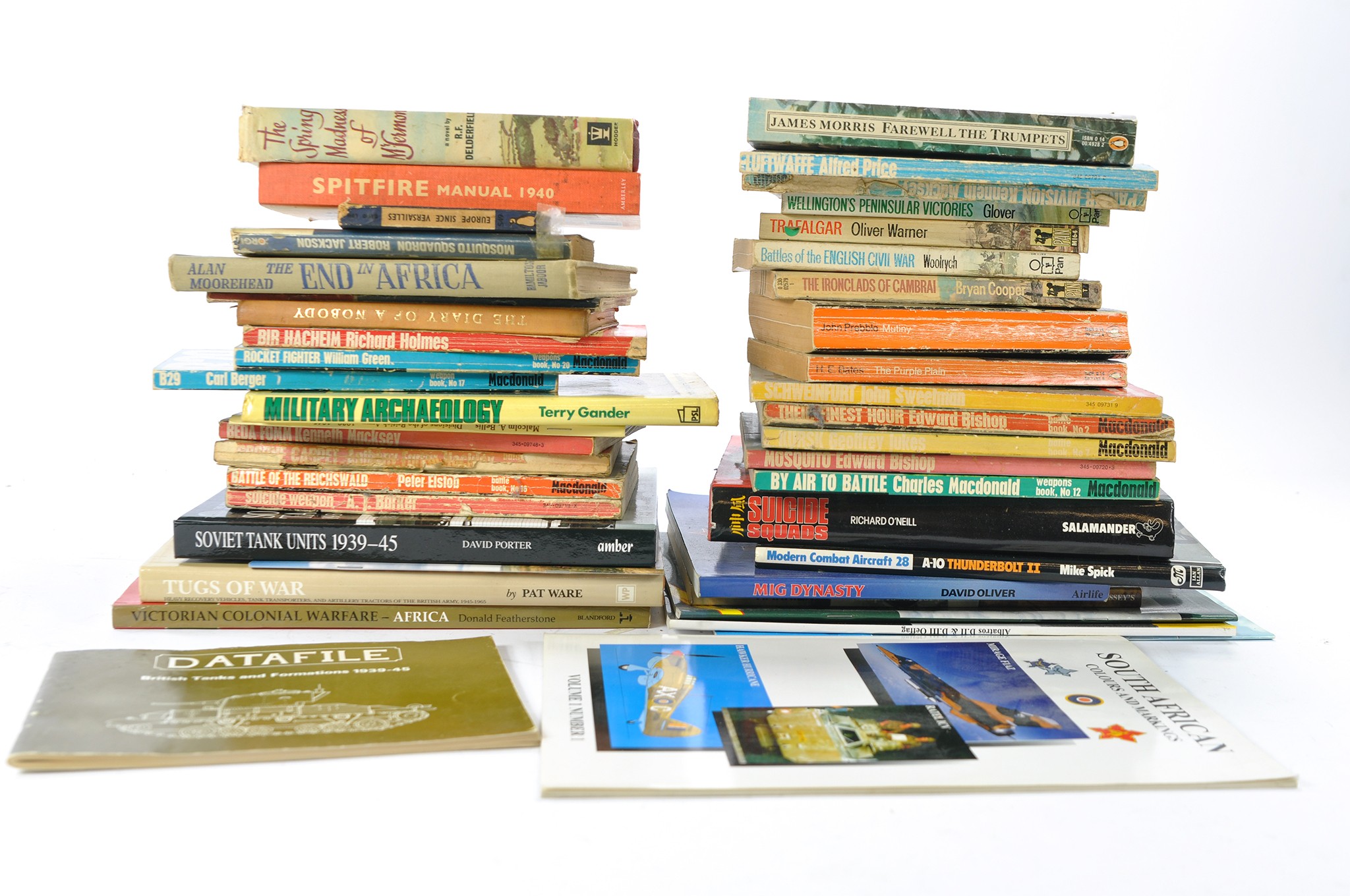 Military interest comprising a group of related reference books / guides plus some fiction.