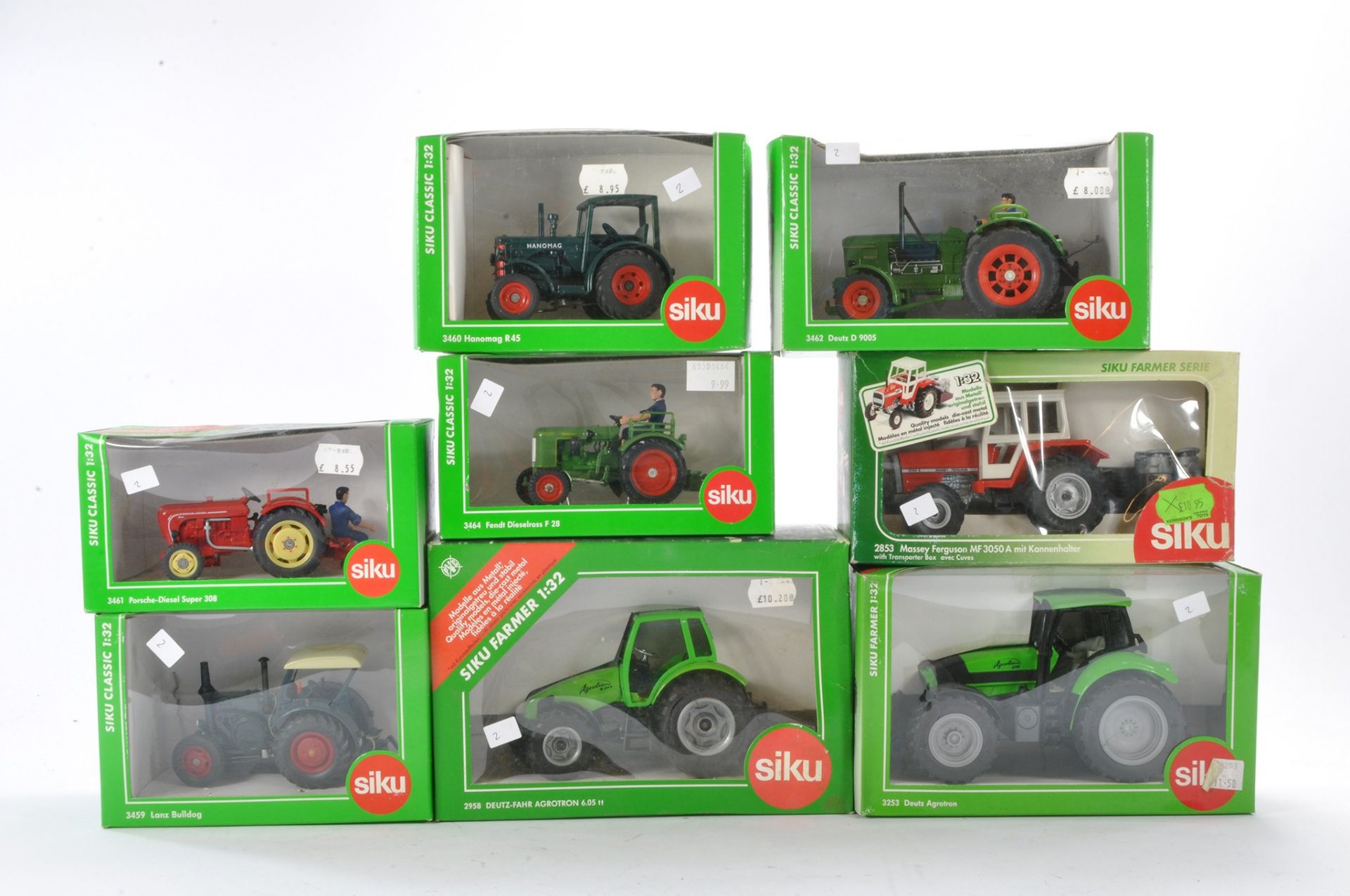 A group of eight Siku 1/32 farm issues comprising tractor and implements including Deutz D9005,