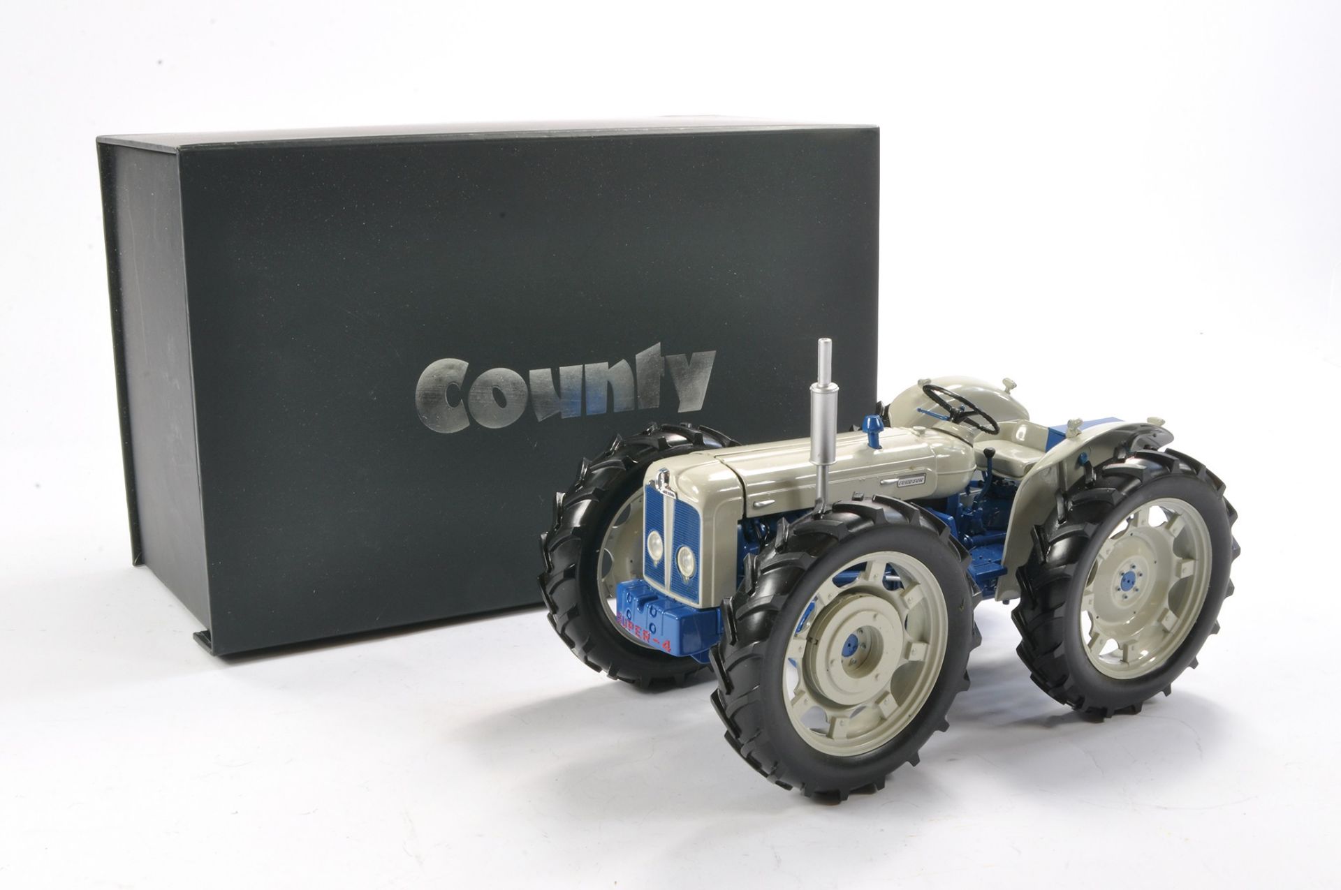 Universal Hobbies 1/16 County Super Four Tractor Special Edition. Looks to be complete without