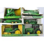 A group of Ertl 1/16 John Deere Tractor and Implement issues, with boxes.