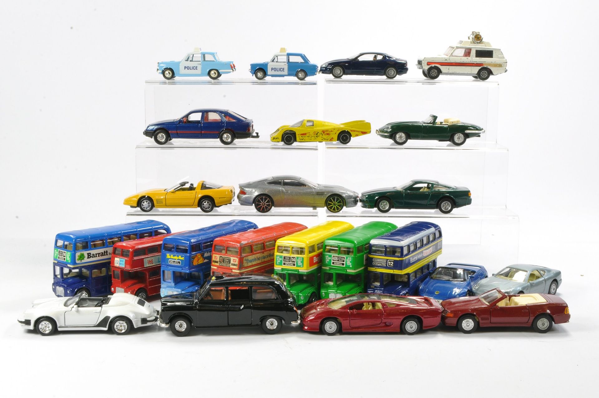 A large and mixed group of loose diecast, mostly to include Corgi inc Buses as shown.