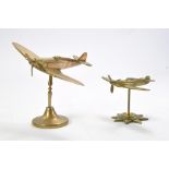 A duo of Brass Desk Brass Model Aircraft comprising a Spitfire (larger model) plus Hurricane.