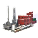 An impressive HO / 1:76 bespoke model railway diorama assortment of commercial / factory buildings