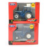 Britains 1/32 Ford TW20 and 10 Tractor issues. Both look to be excellent and secured in boxes.