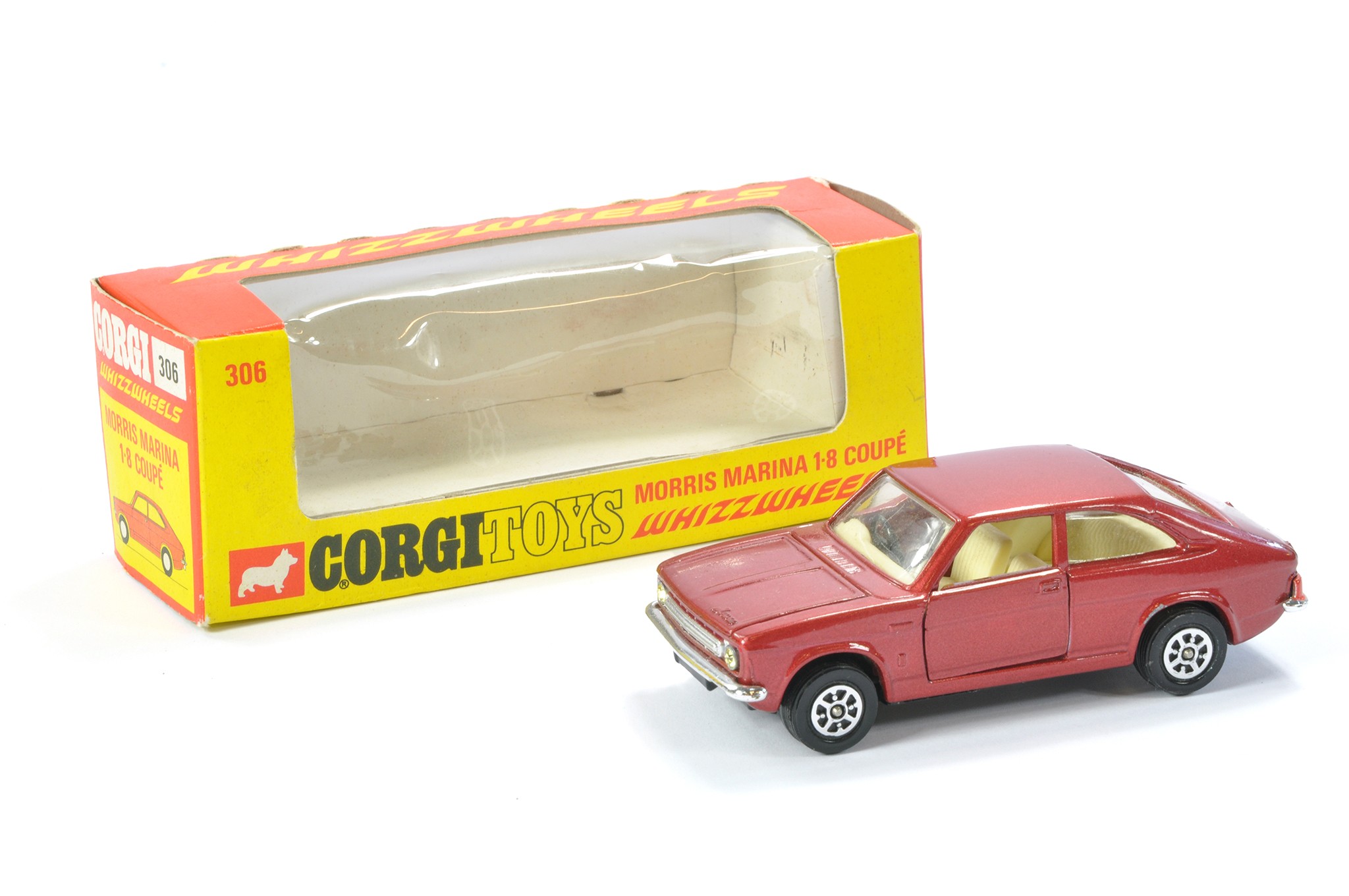 Corgi No. 306 Morris Marina 1.8 Coupe. Cherry red with white interior. Generally excellent, the