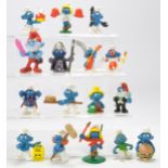 A small group of McDonalds Promotional Smurf Toy Figures as shown.