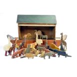 A scarce Antique Wooden Noah's Ark Toy with carved hand painted animal figures as shown. In addition