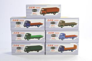 A group of seven Dan-Toy Guy Van diecast issues in various colour liveries as shown. All excellent