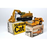 NZG 1/50 diecast model construction issue comprising CAT 245 Hydraulic Excavator. Looks to be
