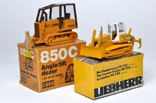 Duo of diecast model construction issues comprising Liebherr and Case Dozers from Conrad / NZG. No