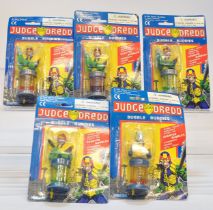 Dorda Toys group of five carded Judge Dredd 'bubble buddies' figures. Factory sealed. Cards would