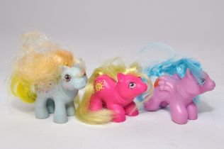 A group of three vintage (1980's) My Little Pony baby ponies as shown. Generally good, some minor