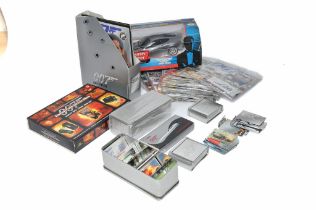 A group of James Bond 007 collectables comprising RC Aston Martin plus various sealed magazines with