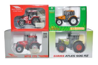 A group of three Universal Hobbies 1/32 tractor issues including Renault, Class and McCormick plus