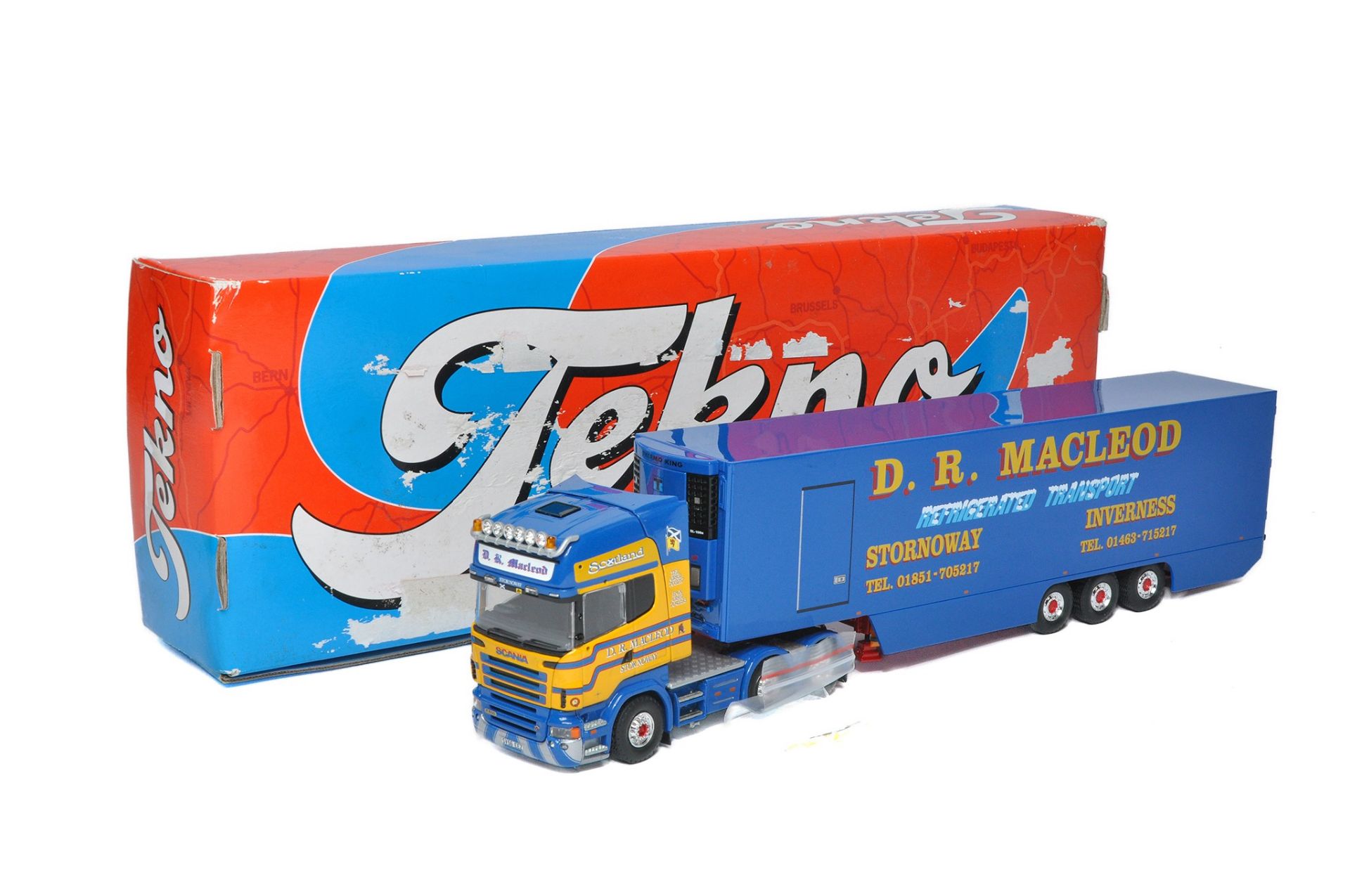 Tekno 1/50 diecast model truck issue comprising Scania Fridge in the livery of D. R. Macleod.