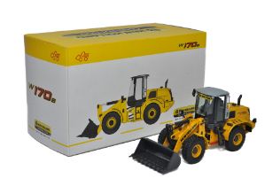 NZG 1/50 diecast model construction issue comprising No. 819 New Holland W170B Wheel Loader. Looks