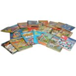 An assortment of vintage Children's Annuals to include Beano Book, Disney, Topper, Babar, Playbox