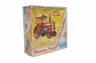 Ertl 1/25 plastic model kit comprising Massey Ferguson 1155 Tractor. Sealed with wrapper.