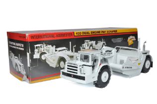 First Gear 1/25 diecast model construction issue comprising International Harvester Scraper (White