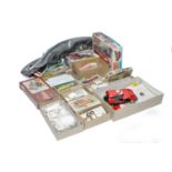 A group of plastic model kits including Airfix Ford Escort, Triumph Herald, Robins and others as