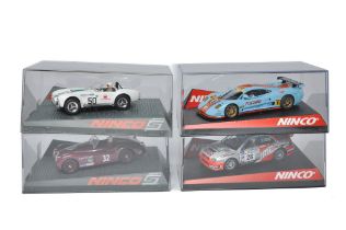 NINCO slot car issues comprising 50385 Subaru Imola no.28, 50428 Mosler Gulf no.9, 50587 Jaguar