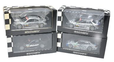 Four boxed 1/43 diecast Minichamps Racing Car issues as shown. All look to be without fault.