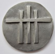 GEOFFREY CLARKE R.A. [1924-2014]. Cross. aluminium relief, unique; signed on the reverse. 8 cm high.