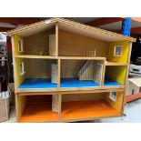A Lundby two section dolls house and collection of various accessories together with a garage