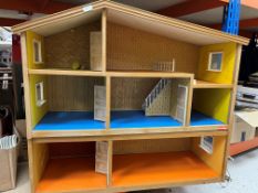 A Lundby two section dolls house and collection of various accessories together with a garage