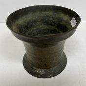 A 17th Century bronze mortar of plain form,