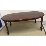 A modern mahogany shaped oval dining table in the 19th Century style,